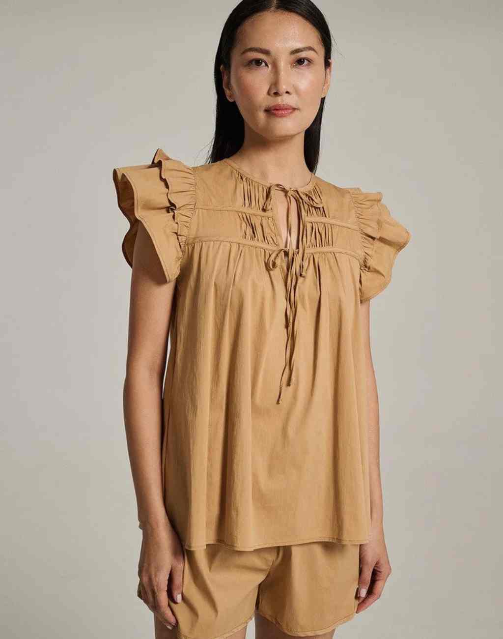 Kunzitis Blouse with Tiered Flutter Sleeves, Pintuck Details and Ties | Beige or White - Visit Nifty Devotion Twins 