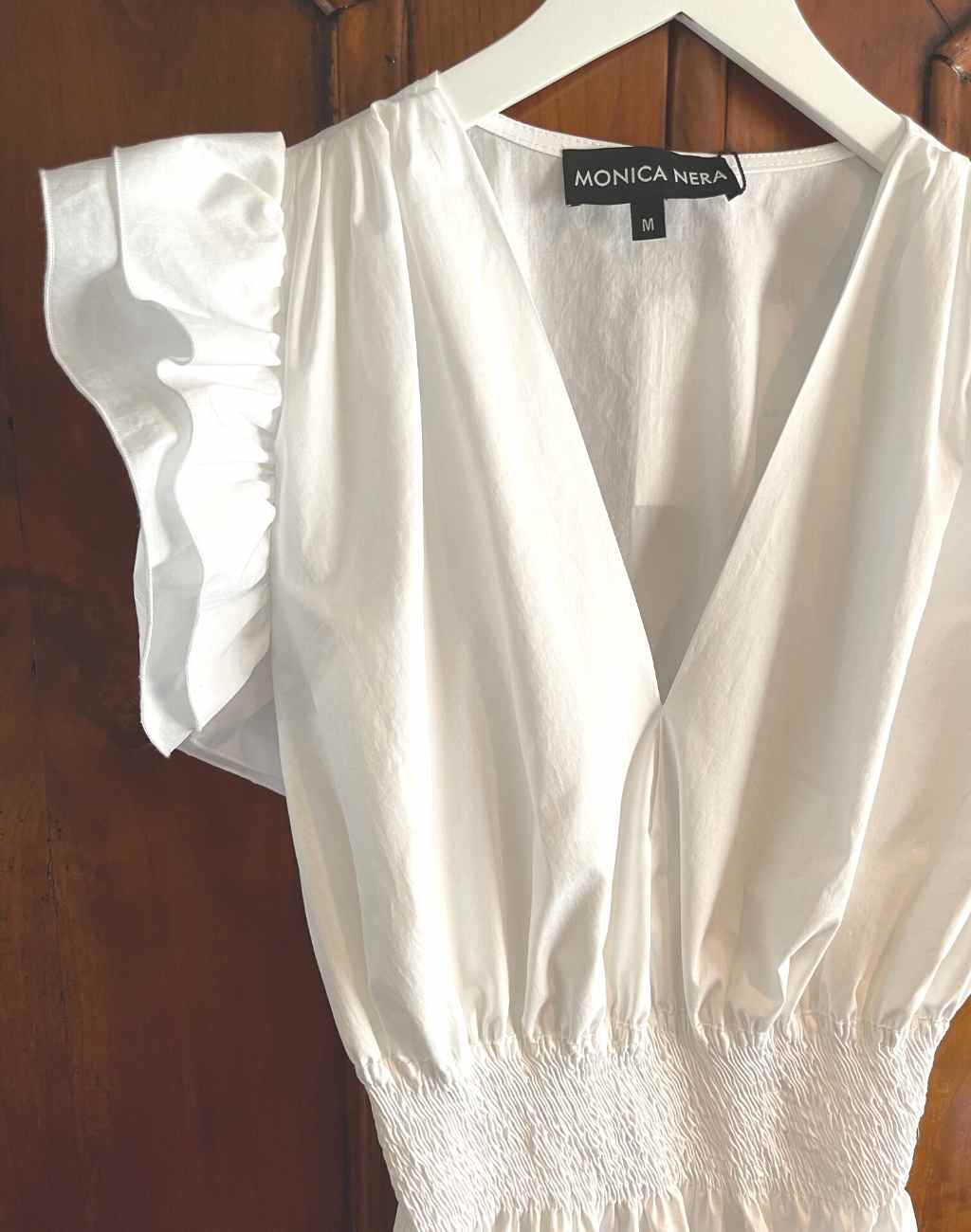 White Cathy Top with Tiered Ruffle Sleeves and Smocked Waist - Visit Nifty Monica Nera 